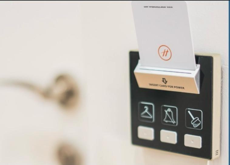 a close up of a calculator with a box on it at Class Apartments in Tirana