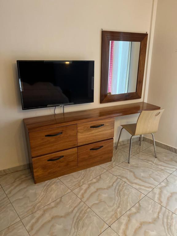 Μια τηλεόραση ή/και κέντρο ψυχαγωγίας στο résidence o-calme