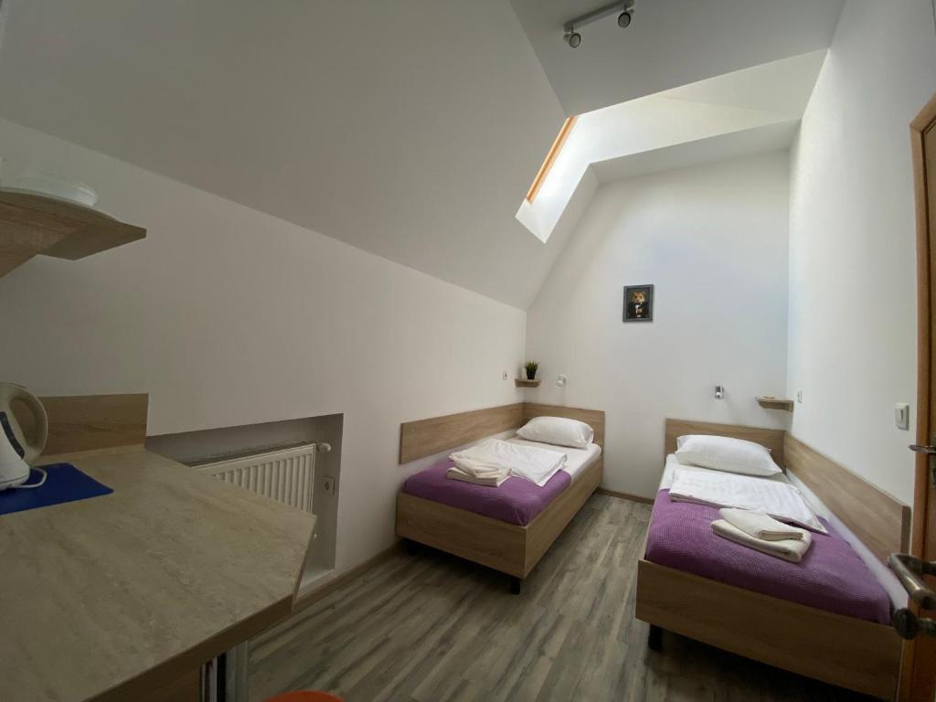 Ένα ή περισσότερα κρεβάτια σε δωμάτιο στο Hamster 007 Secret Hotel