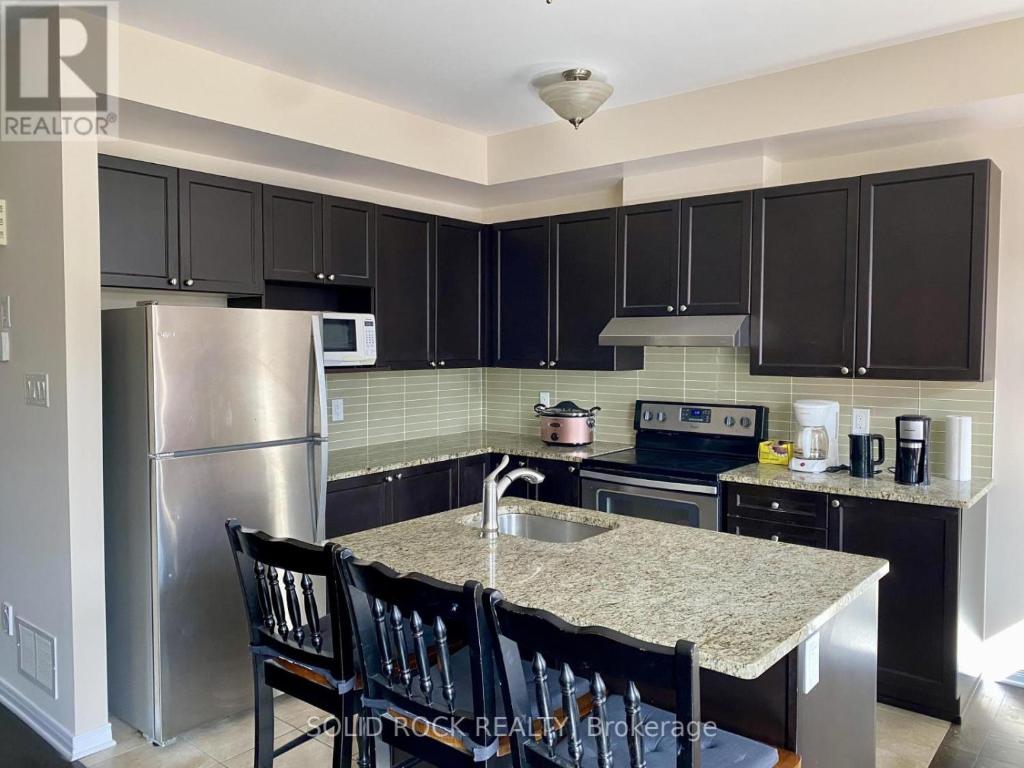 Kuchyň nebo kuchyňský kout v ubytování Cozy Prime Home