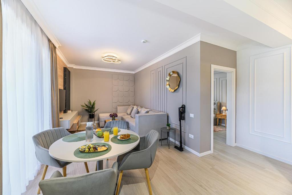 Et opholdsområde på Poiana View Apartment