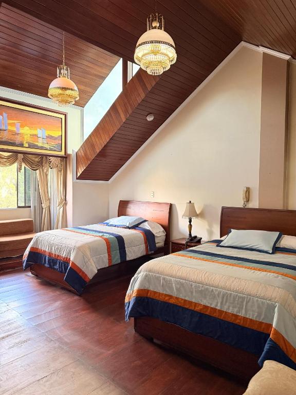 Llit o llits en una habitació de House Loft Loja