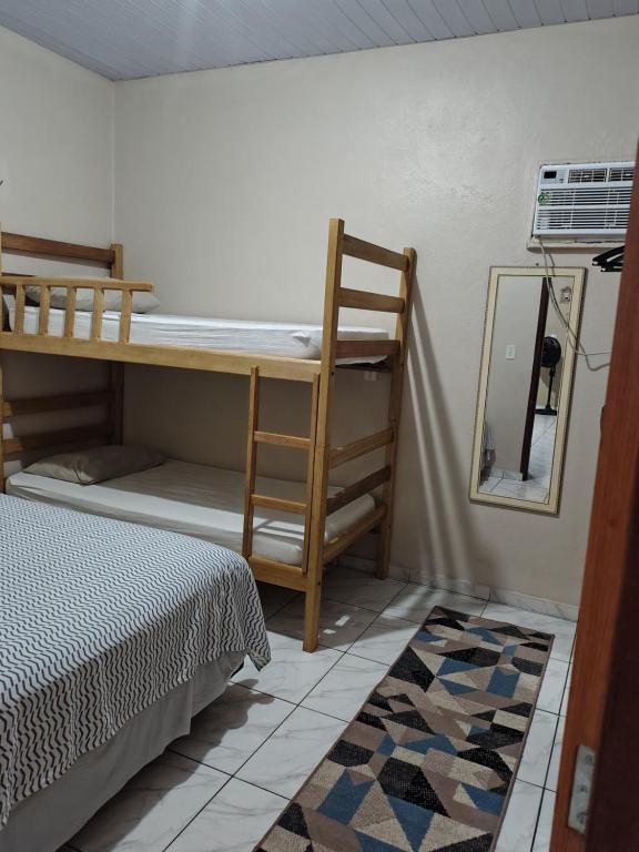 Postel nebo postele na pokoji v ubytování KL Residencial