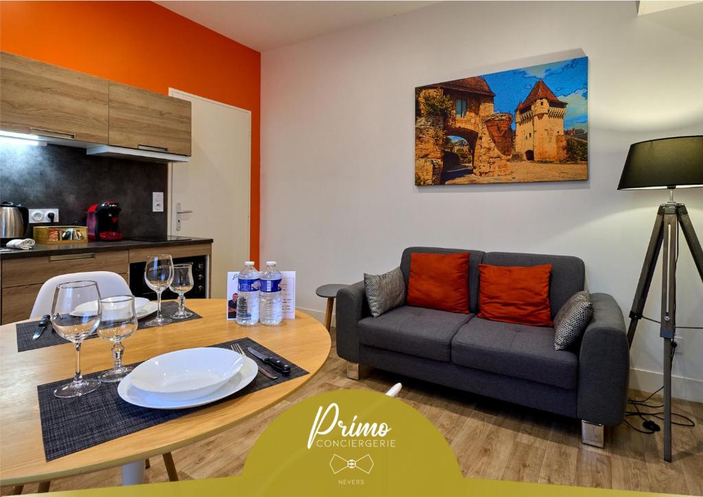 Posezení v ubytování Le Faidherbe style Appart' Hôtel - WIFI gratuit - Parking Gratuit Calme et Lumineux