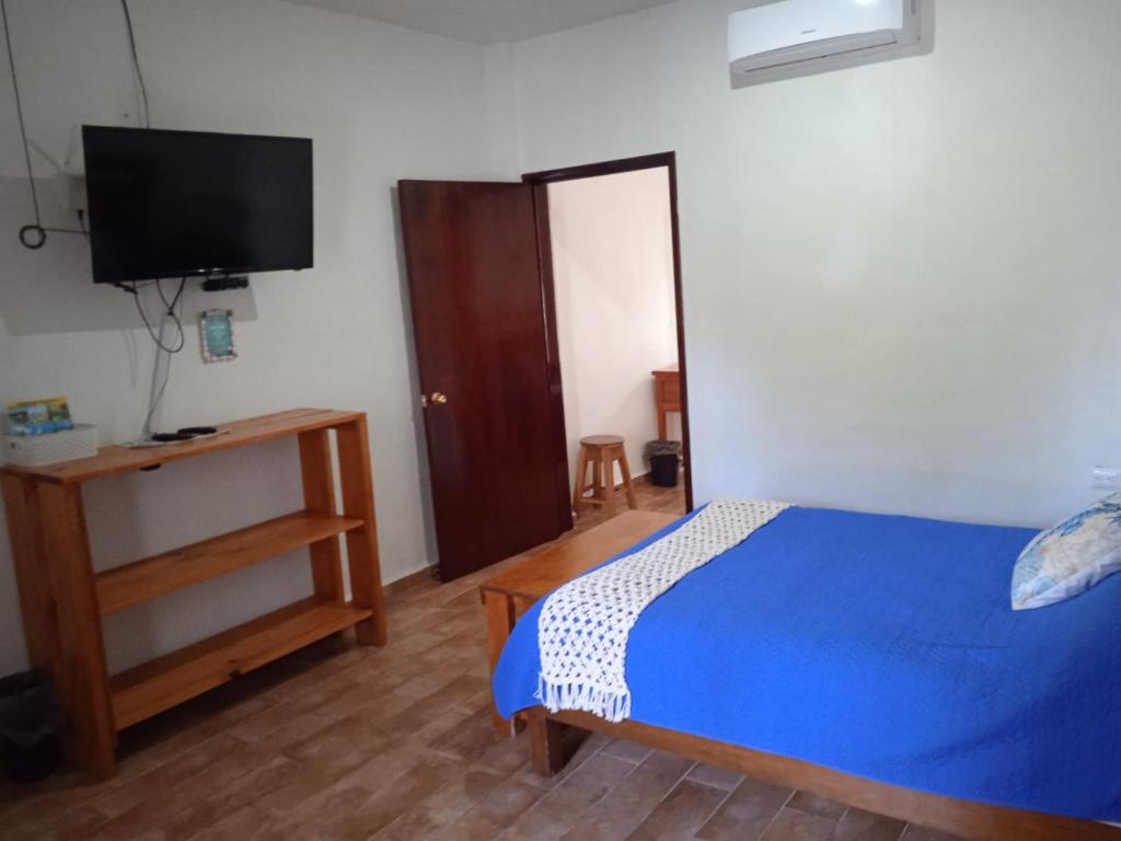 Postel nebo postele na pokoji v ubytování Cocolitos