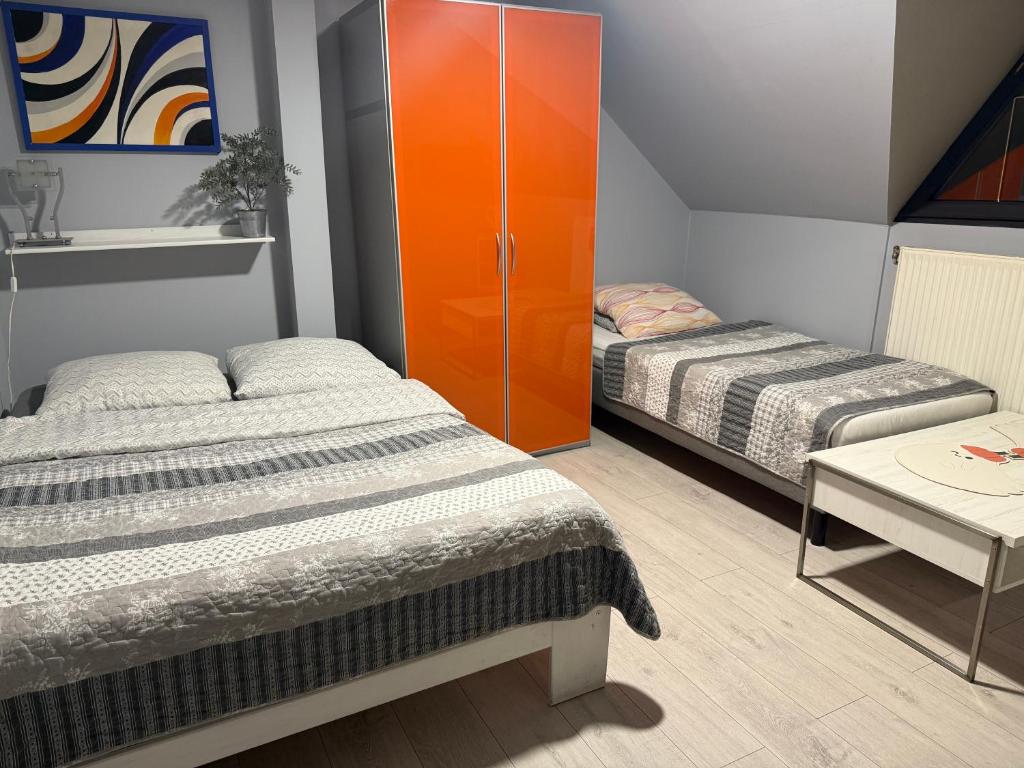 Ένα ή περισσότερα κρεβάτια σε δωμάτιο στο Azyl nad Potokiem