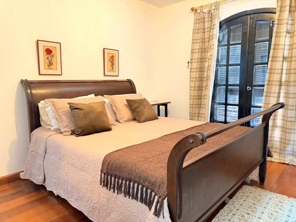 Postel nebo postele na pokoji v ubytování Vivare Jordão