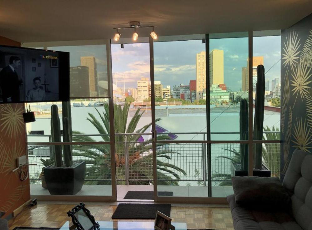 Et tv og/eller underholdning på Goldsmith Confort Suites Polanco