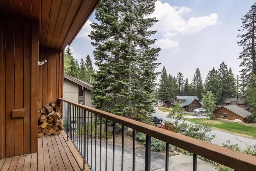 a balcony of a house with a tree at Spacious 3BD & Loft Villa - Convenient to Slopes in Mammoth Lakes