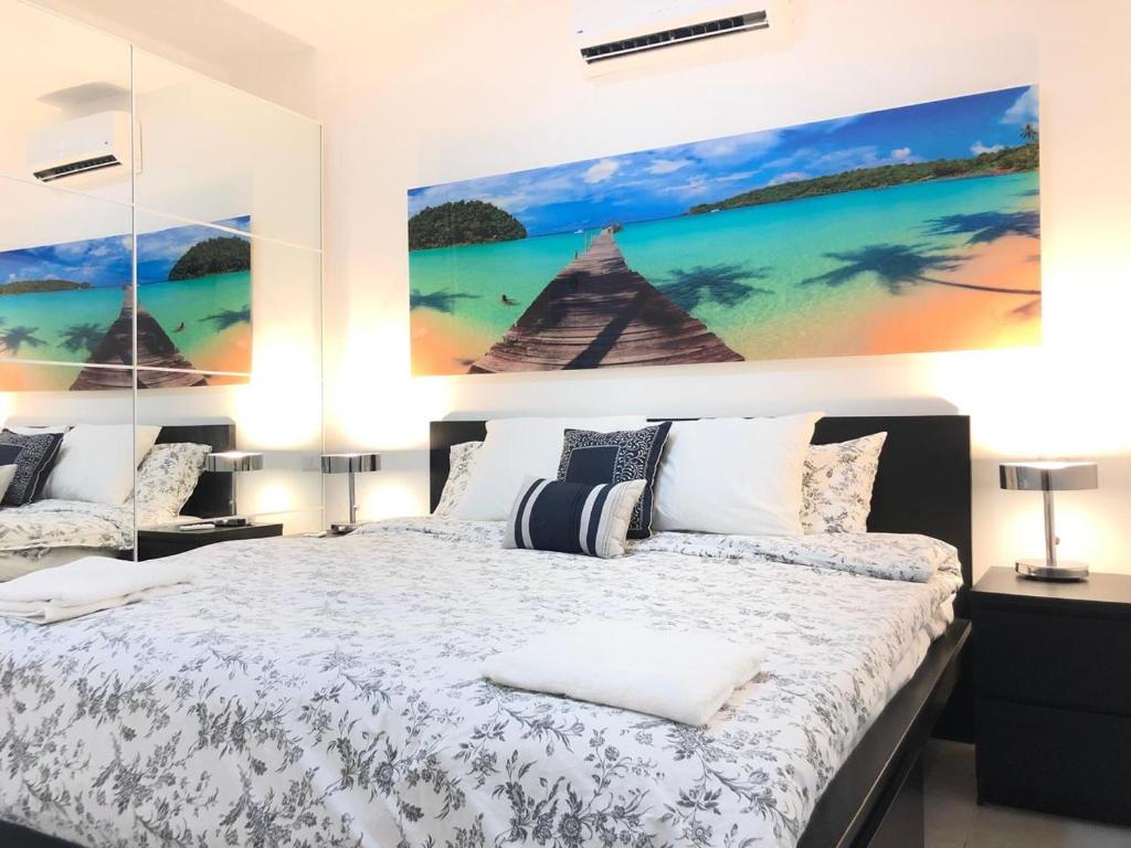 Postel nebo postele na pokoji v ubytování Punta Cana Beach Pool Bavaro 1