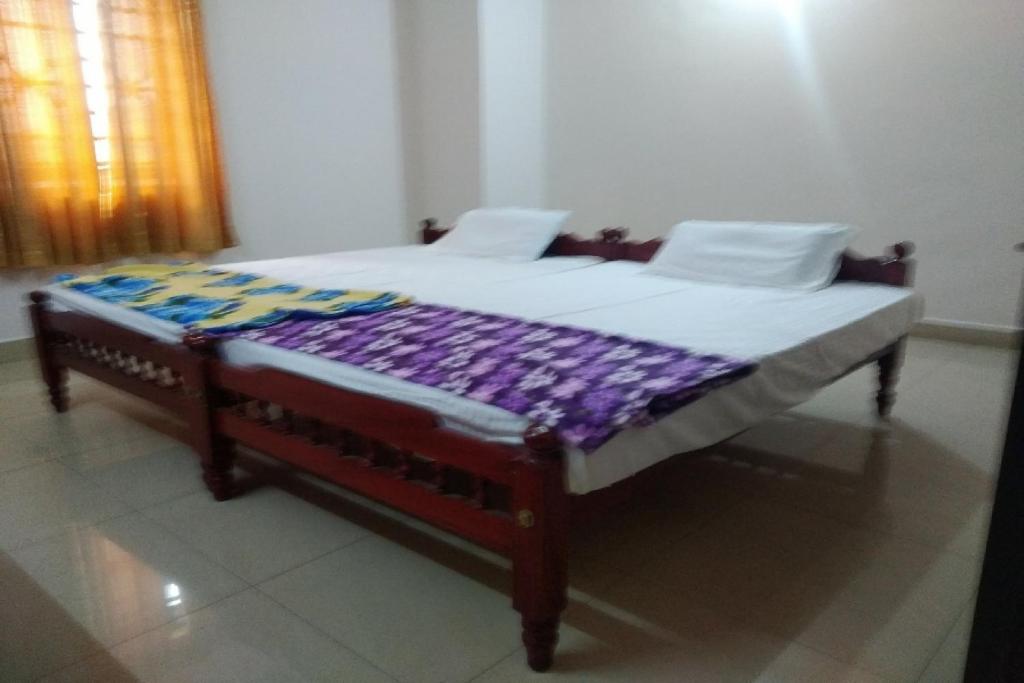 Gallery image of SPOT ON Sana Tourist Home in Kollam