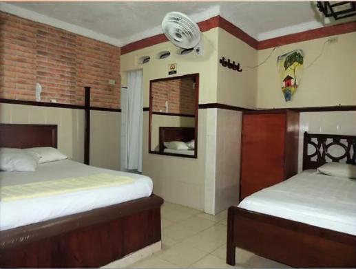 Ένα ή περισσότερα κρεβάτια σε δωμάτιο στο Hotel Mar Azul