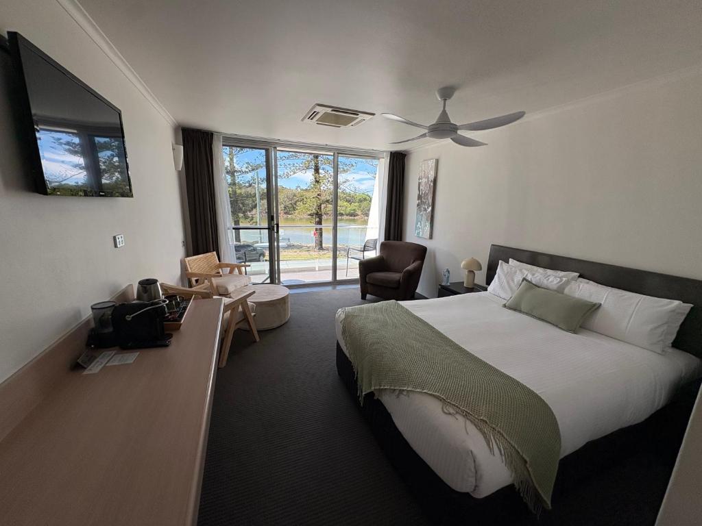 Postel nebo postele na pokoji v ubytování Brunswick River Inn