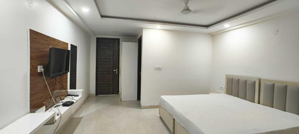 Postel nebo postele na pokoji v ubytování Hotel O Green Orch