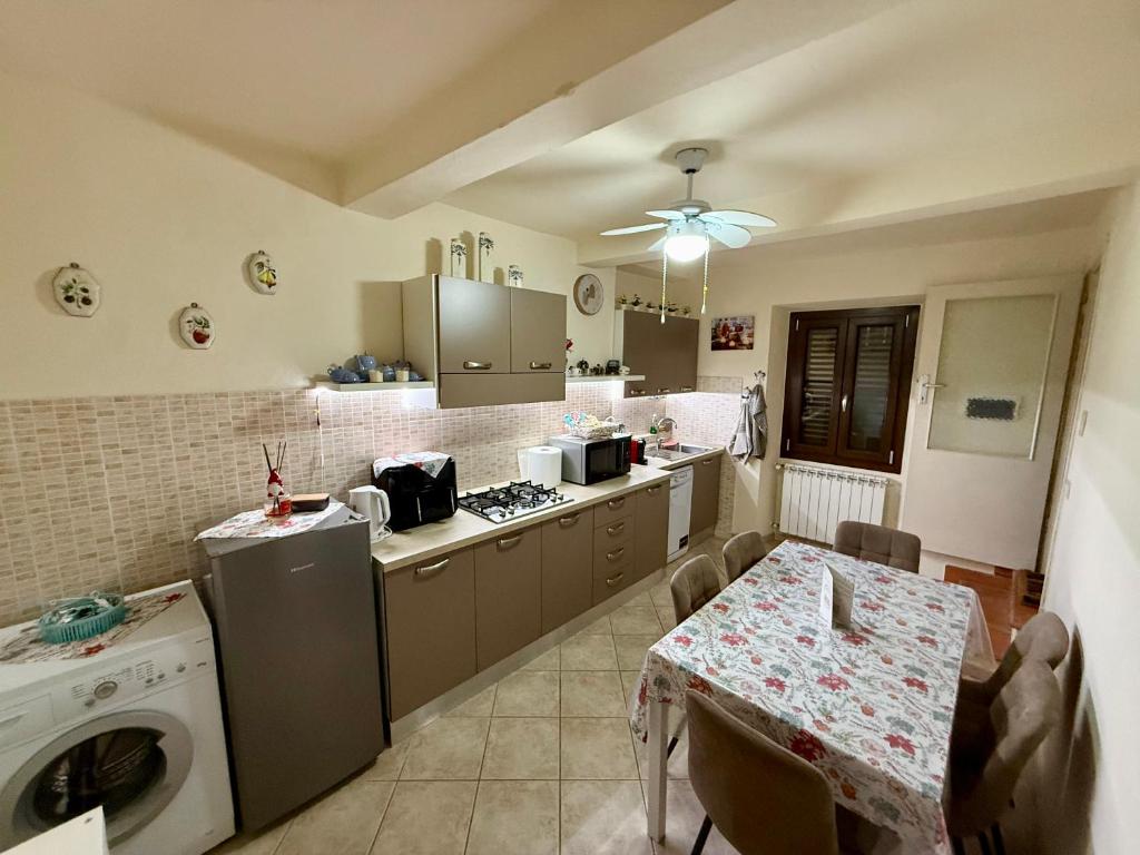 Kuchyň nebo kuchyňský kout v ubytování Casa di Patti