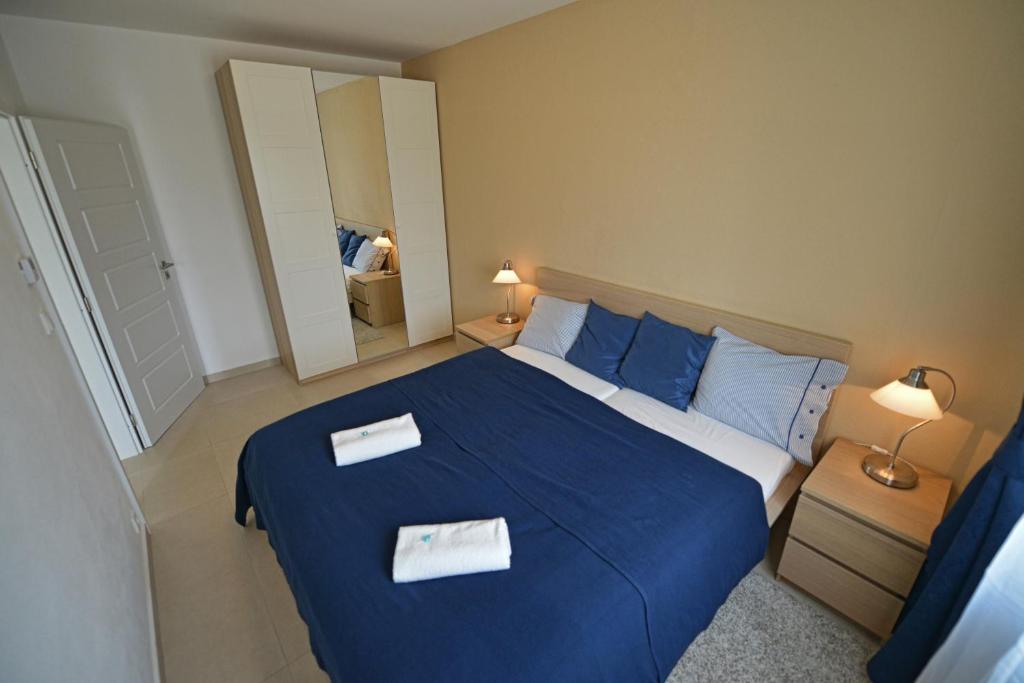 Postel nebo postele na pokoji v ubytování Apartmány Belveder