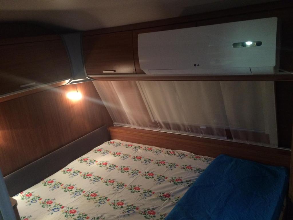 Ein Bett oder Betten in einem Zimmer der Unterkunft Caravan In the Desert