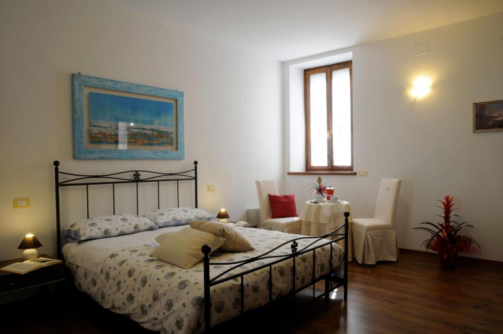 Postel nebo postele na pokoji v ubytování Casa Pellis