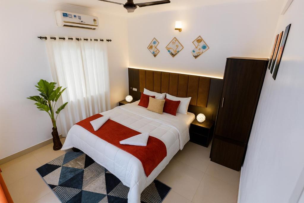 Ένα ή περισσότερα κρεβάτια σε δωμάτιο στο PVR International