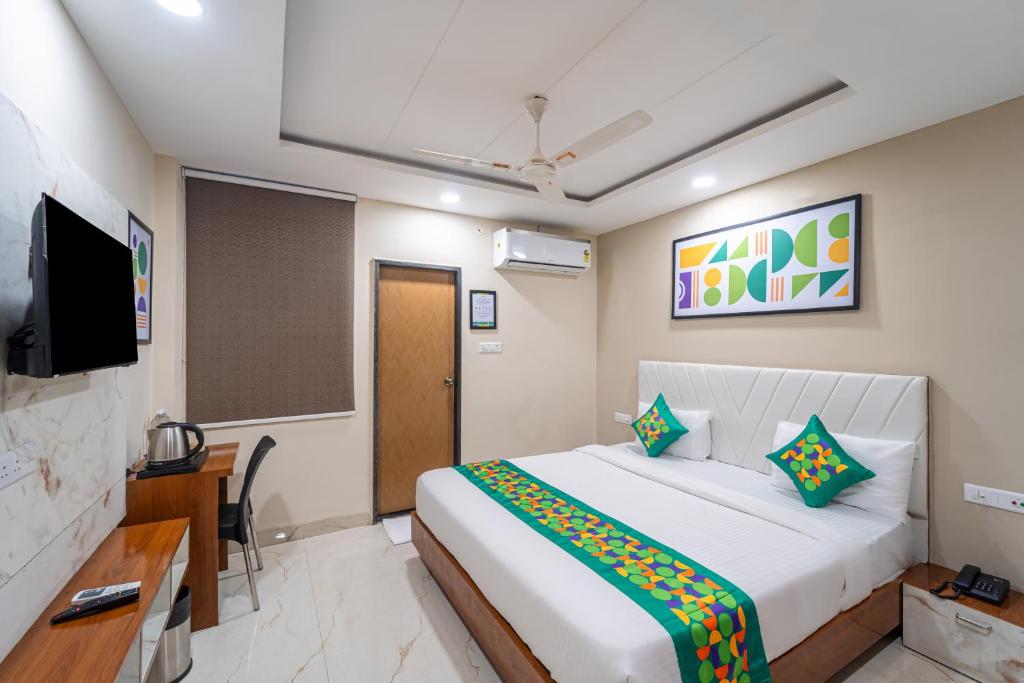 TV a/nebo společenská místnost v ubytování Treebo Grand