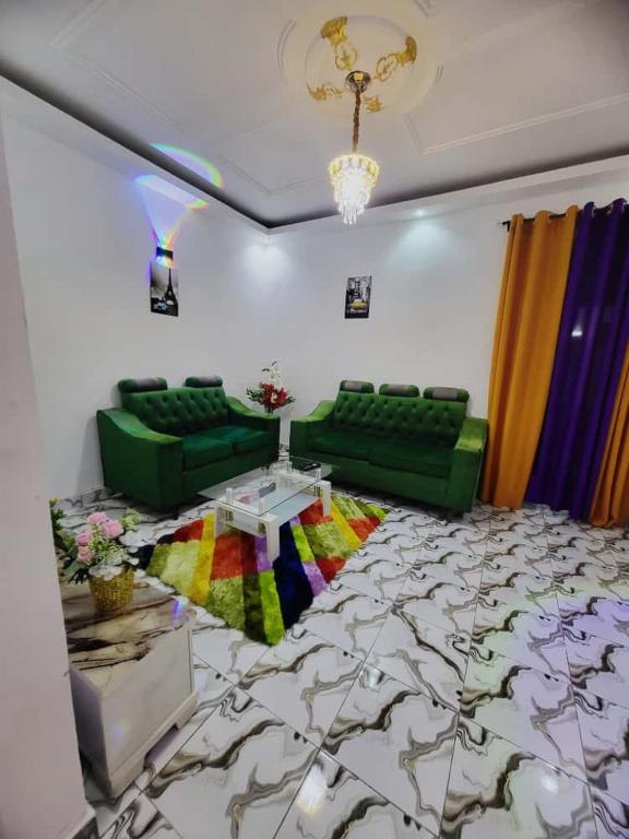 Χώρος καθιστικού στο Studio entièrement meublé à Douala Yassa