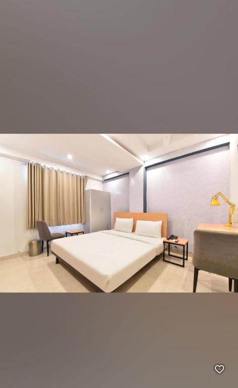 Ένα ή περισσότερα κρεβάτια σε δωμάτιο στο Hotel me-casa inn