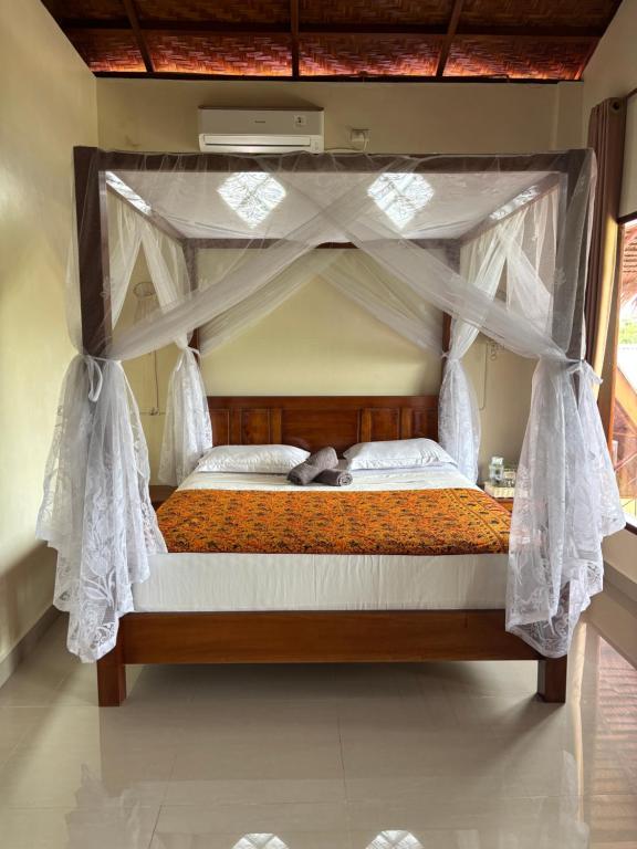 Sumatran Ethical Expeditions and Trekking - Zimmer Mit Kingsize-Bett Und Gartenblick