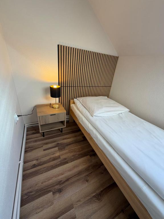 Postel nebo postele na pokoji v ubytování NOCLEGI General