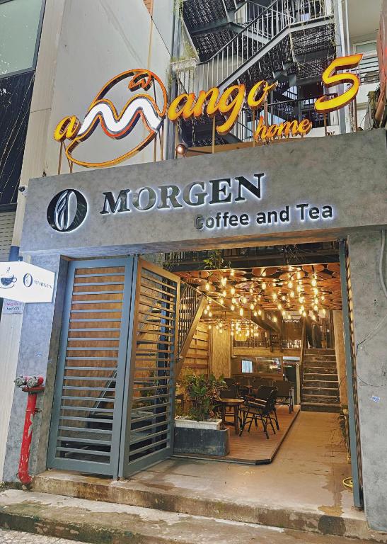a morrison coffee and tea sign in front of a building at Amango Home Brand 5 in Ho Chi Minh City