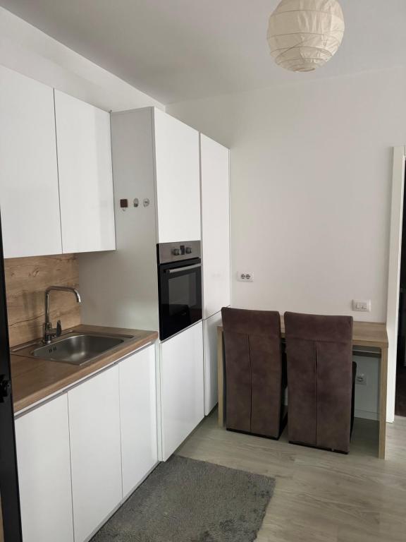 Η κουζίνα ή μικρή κουζίνα στο Sunflower Apartments