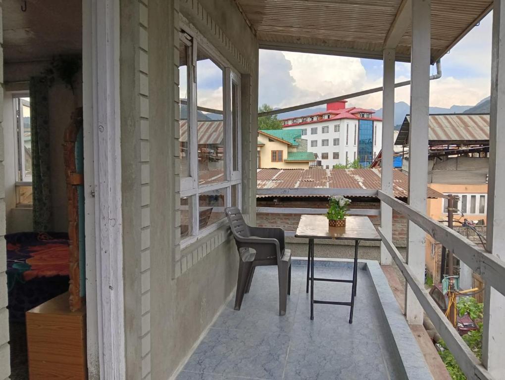 Μπαλκόνι ή βεράντα στο New World Guest House