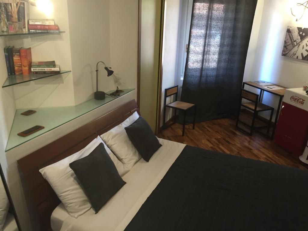 Postel nebo postele na pokoji v ubytování B&B Treviglio