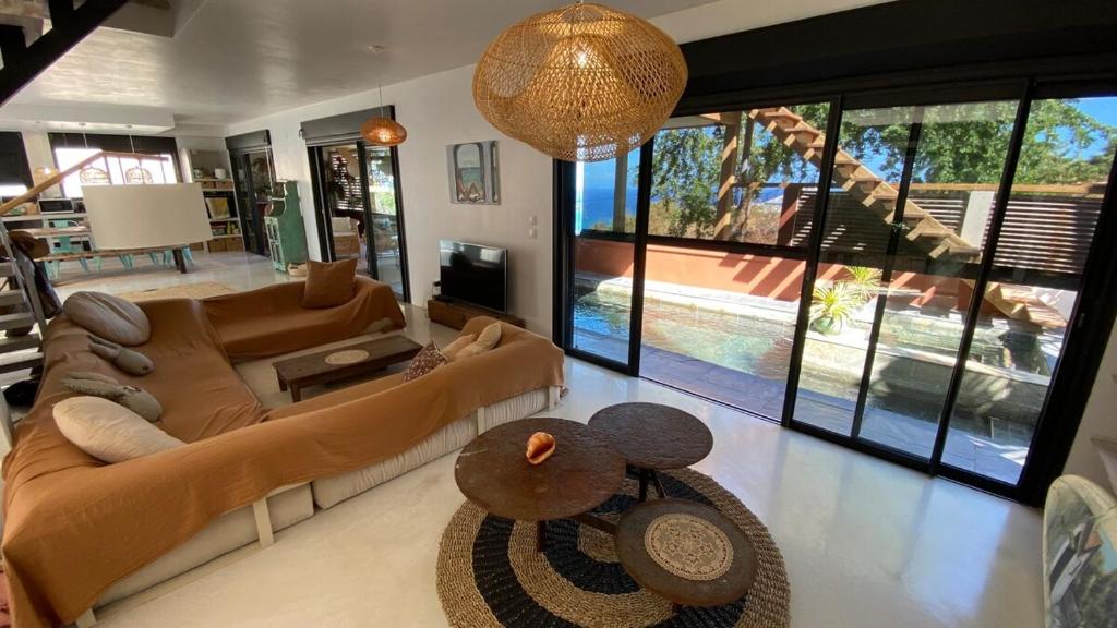 Istumisnurk majutusasutuses Villa Mahana piscine privée vue mer Etang Salé