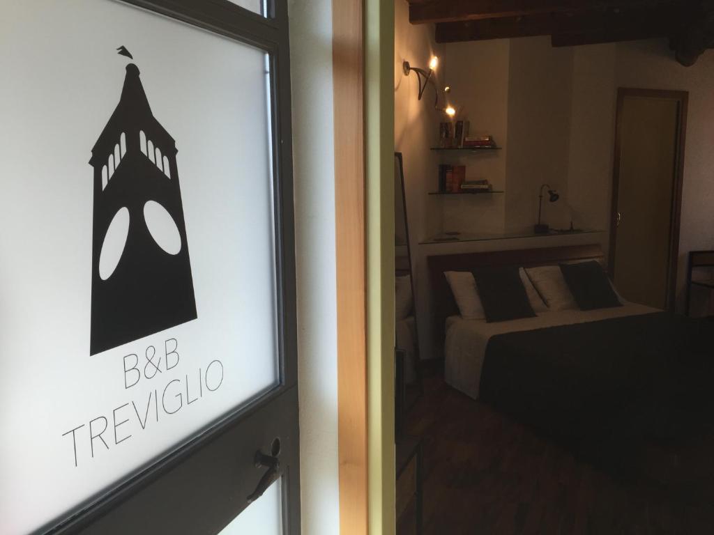 Postel nebo postele na pokoji v ubytování B&B Treviglio
