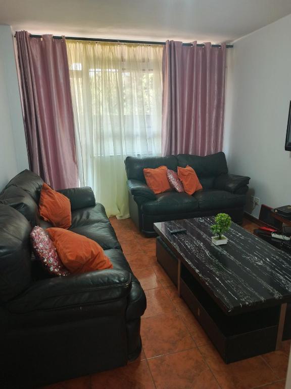 Posezení v ubytování EcoCity Lodge