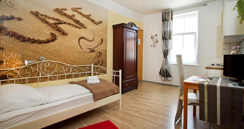 Postel nebo postele na pokoji v ubytování Hotel Neun 3/4