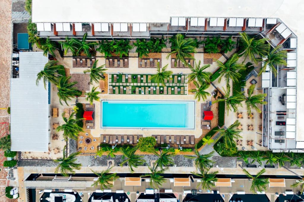 an overhead view of a building with a swimming pool at The Perry Hotel & Marina Key West in Key West