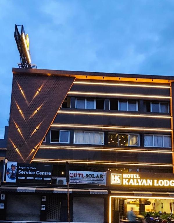 a building with a pyramid on top of it at Hotel Kalyan in Erode