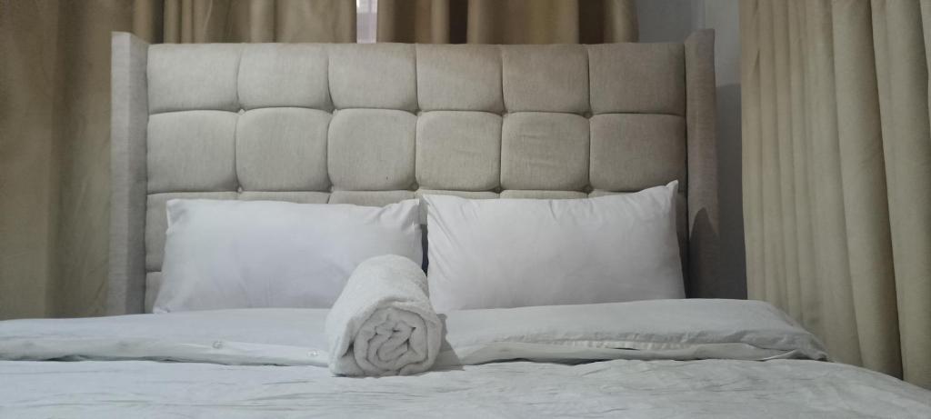 Postel nebo postele na pokoji v ubytování Serene Homes-Membley