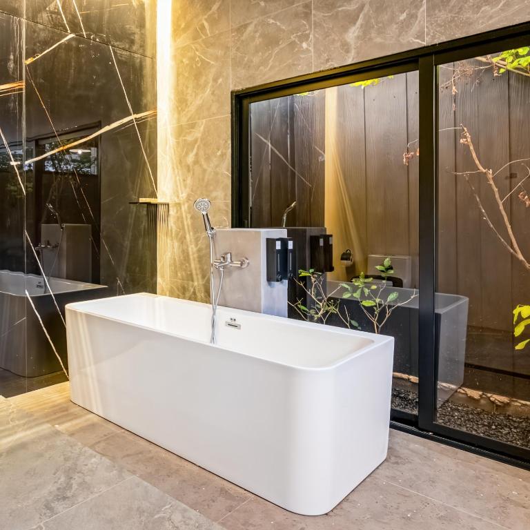 Ένα μπάνιο στο The Arch Casa - Design Hotel Pai