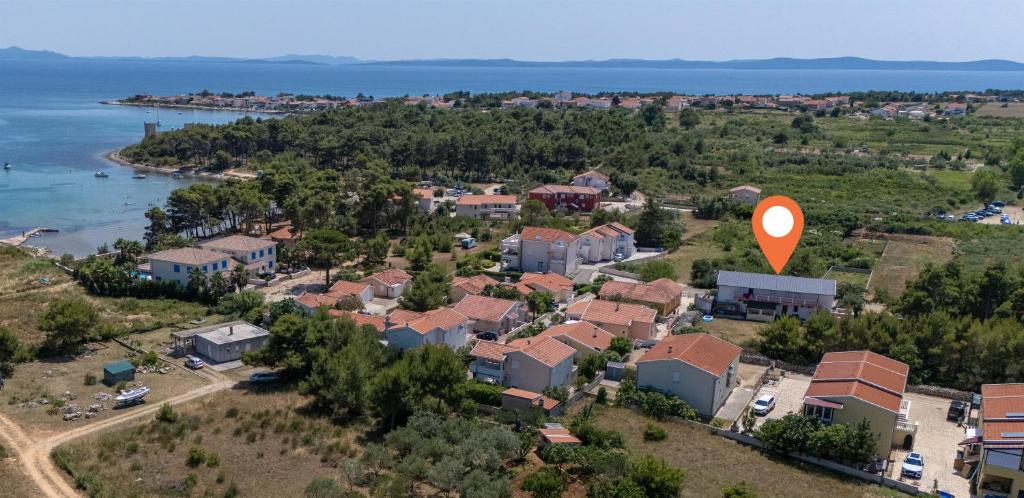 an aerial view of a residential suburb with a red sign at Apartments Vink in Vir