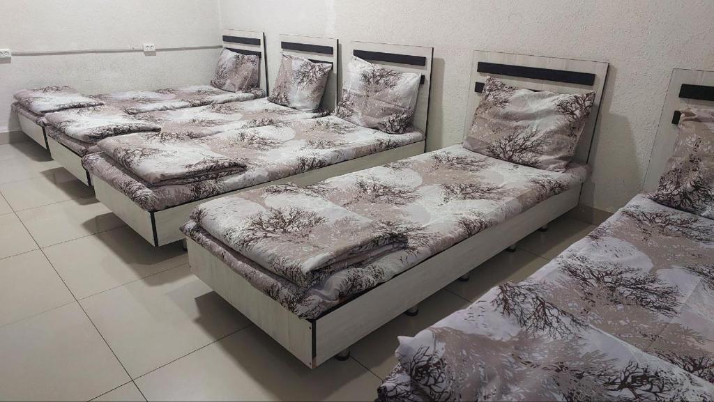 Ένα ή περισσότερα κρεβάτια σε δωμάτιο στο Alo Mutal hostel