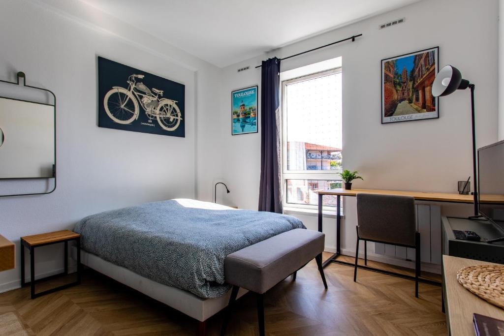 Postel nebo postele na pokoji v ubytování Cocon Moderne Compans Caffarelli - Métro, Charme & Confort