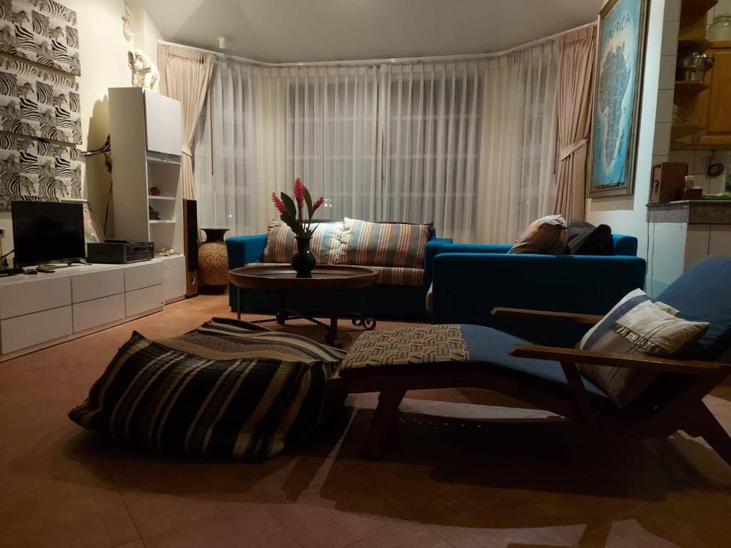 Posezení v ubytování Mooni Sunshine Villa