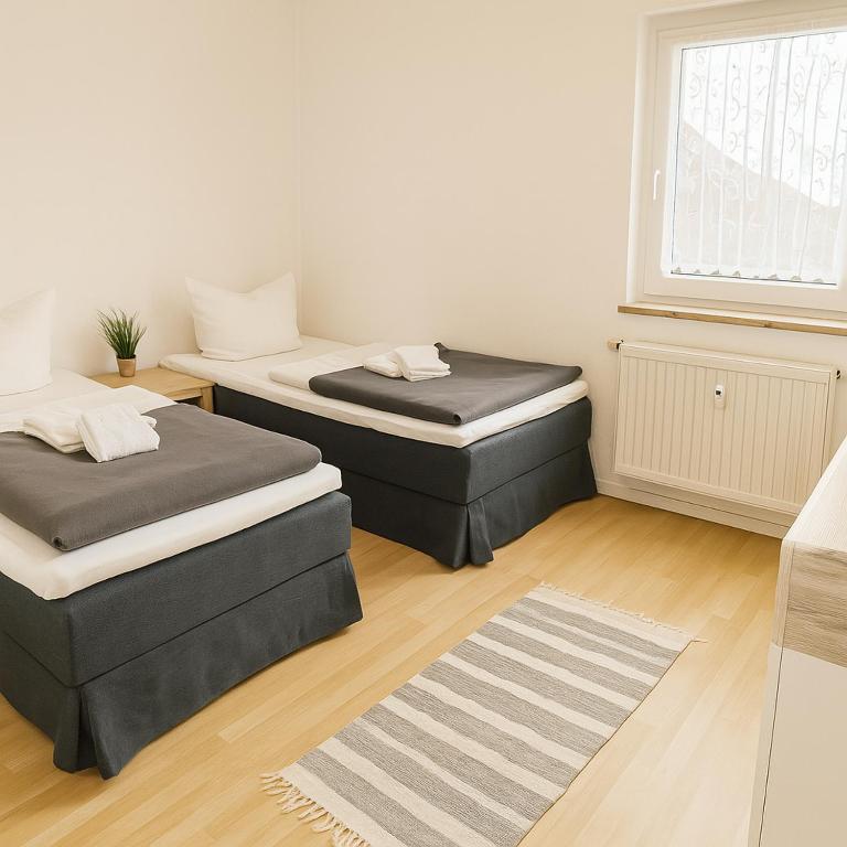 SUNNYHOME Monteurwohnungen und Apartments nahe Regensburg - Apartment Mit 3 Schlafzimmern