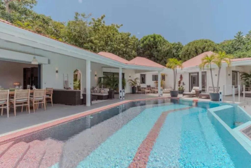 Panoramic Pool Deck And Garden Oasis