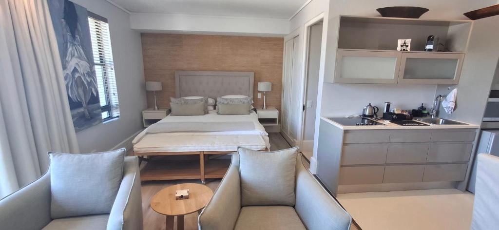 Postel nebo postele na pokoji v ubytování Luxury Studio 106