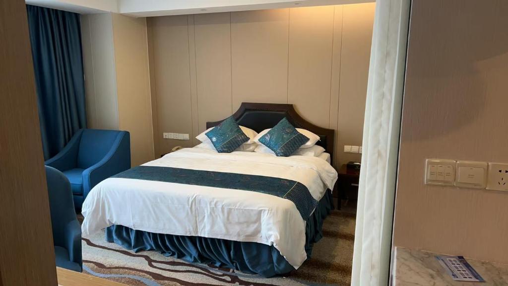 Voodi või voodid majutusasutuse Vienna International Hotel toas