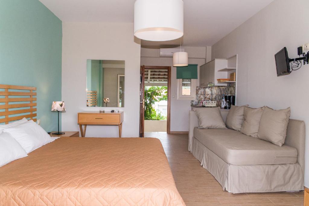Posteľ alebo postele v izbe v ubytovaní Lemonia Accommodations