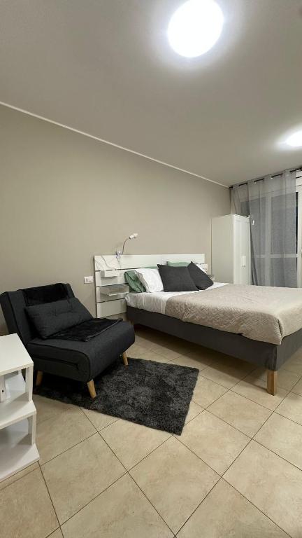 Postel nebo postele na pokoji v ubytování Confortevole appartamento vicino a San Raffaele Ospedale